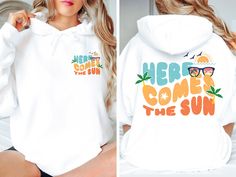 Here Comes The Sun Hoodie, Trendy Summer Season Shirt For Women, Beach Sweater, Minimalist Holiday Themed Sweatshirt, Gift For Bestie, E7885 WELCOME TO LITTLE PREPPY TEE.... If you are looking for soft, comfortable, first-class clothes that you can design for your most special days or your loved ones, you are at the right place! We love what we do here at Best Creative Designs and we strive to make your shopping experience just right for you. If you have any questions about our products, feel fr Summer Letter Print Hoodie Top, Hooded Letter Print Top For Summer, Casual Vacation Hoodie Top, White Summer Hoodie Top, White Hoodie For Summer, Cotton Hoodie Tops For Vacation, Casual Beach Season Hoodie Tops, Casual Hoodie Tops For Beach Season, White Trendy Summer Hoodie