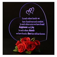 a heart shaped birthday card with roses in front of it and the words happy birthday to you