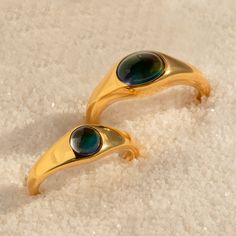 Experience a wave of nostalgia with our Signet Mood Rings Set! Available in both bold and mini sizes, these rings feature color-changing stones that reflect your mood, ensuring you're always in tune with your emotions. Stack this bold ring with other sentimental jewelry pieces for a truly nostalgic and heartfelt look, making it the perfect gift for your sister to cherish precious memories together ♡ SKU: RR-RR129, RR-RR136, BB-RB001 Product Details Material: High Quality Solid 925 Sterling Silve Modern Iridescent Round Rings, Modern Iridescent Round Ring, Sentimental Jewelry, Initial Tag Necklace, Mood Rings, Mood Stone, Sentimental Jewellery, Sideways Initial Necklace, Dainty Initial Necklace