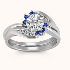 a diamond and blue sapphire engagement ring set