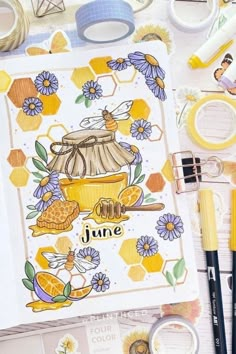 an open notebook with honey and bees on it