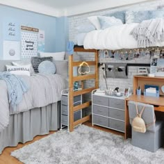 a bedroom with a loft bed and desk