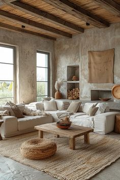 a living room filled with lots of white furniture