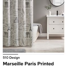 a bathroom with a shower curtain that has drawings on it and the words, 50 design marseille paris printed