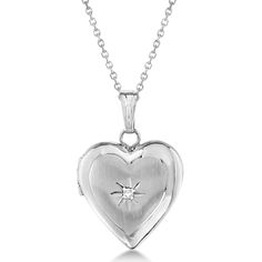 Go straight to the heart with this locket of love set in 14k white gold. This picture locket captures your treasured memories, holding two locket photos held within lovely heart shapes. Adding a single diamond accent in the center of this heart photo locket makes it even more special, just like the love you have for each other. #locket #lockets #lockett #locketpendant #locketnecklace #locketloves #locketforsale #lockettpentz #lockettmeadows #locketbracelet #locketcloset #lockettalks Gold Lockets, Jewelry White Gold, Kids Jewelry Box, Locket Jewelry, Gold Heart Locket, Picture Locket, Heart Photo, Locket Bracelet, Heart Locket Necklace