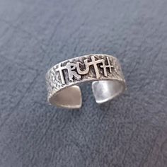 Sure, here's a possible high-ranking description for a Truth Adjustable Gothic Silver Ring: Looking for a striking piece of jewelry that combines elegance with a touch of edginess? Look no further than our Truth Adjustable Gothic Silver Ring! Crafted from high-quality silver and featuring intricate gothic-inspired detailing, this ring is sure to turn heads and make a statement. Plus, its adjustable design ensures a perfect fit for any finger. Whether you're dressing up for a special occasion or Justice For Johnny Depp, Silver Arm Cuff, Angel Wing Ring, Upper Arm Cuffs, Silver Cleaner, Gothic Rings, Snake Earrings, Arm Cuff, Thumb Rings