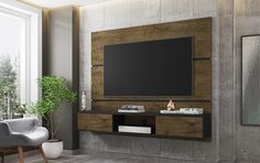 a living room with a large flat screen tv mounted to the side of a wall