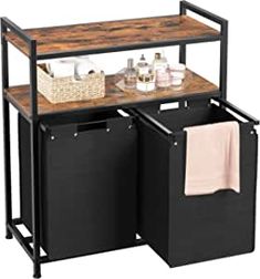 two black bins under a wooden shelf with towels and other items on it's sides