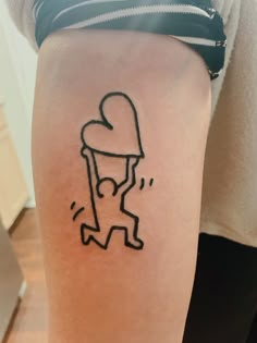 a person with a tattoo on their arm