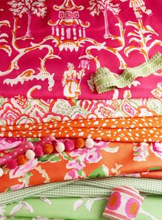 an image of some colorful fabrics on the webpage for fabricfabrist com