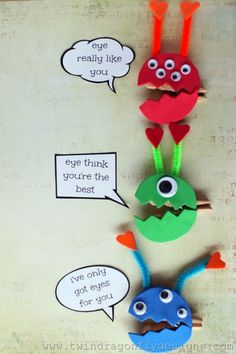 three paper monsters with speech bubbles attached to them