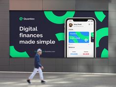 a man walking down the street in front of a digital finance sign and mobile phone