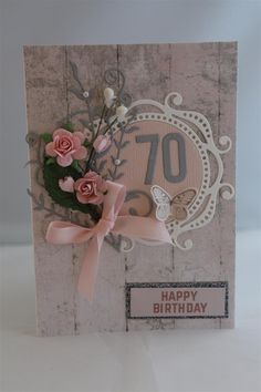 a birthday card with pink roses on it