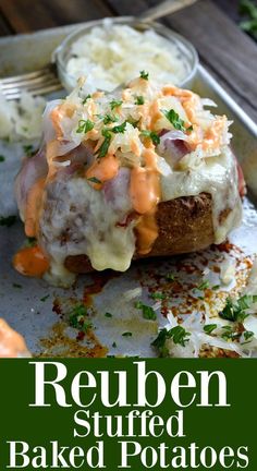 a baked potato covered in melted cheese and garnished with parsley