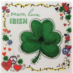 a shamrock with peace, love and irish symbols on it