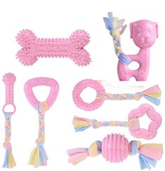 the toys are all pink and have tassels, bows, and other accessories