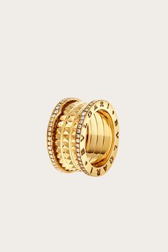 B.zero1 Rock four-band ring in 18 kt yellow gold with studded spiral and pavé diamonds on the edges.  $7,100.00 Jewelry Photoshoot, Gold Statement Ring, Luxury Accessories, High Jewelry, Diamond Wedding Bands