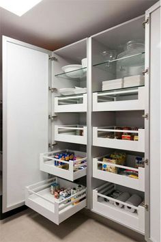 an open pantry with lots of food in it