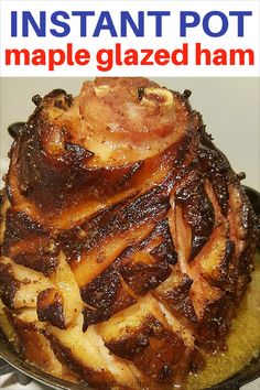 a large pile of cooked ham sitting on top of a pan with the words instant pot maple glazed ham