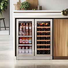 a refrigerator with two doors and shelves filled with bottles