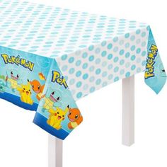 a table cover with pokemon characters on it