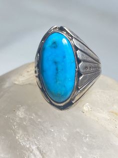 "Turquoise ring Navajo long sterling silver women men Size 8.25 Between a size 8.25 and a size 8.50 Weight 13.9g Widest part 5/8\" Thinnest part 1/4\" Free Shipping & Free Postal Insurance Delivered in a Gift Box If you do not want the ring polished and want to leave the natural patina please let me know at the time of purchase as I do polish rings before I ship rings out. Thanks Free First Class shipping and postal insurance is included. If you want to upgrade to priority kindly pay an addi Western Style Blue Sterling Silver Ring, Western Style Stamped 925 Turquoise Ring, Navajo Women, Three Leaf Clover, Mermaid Ring, Mermaid Pendant, Vintage Sterling Silver Rings, Turquoise Rings, Pinky Ring