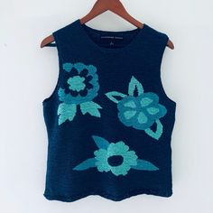 "Beautiful blue and turquoise floral knitted top from the 90's made for \"Josephine chaus\" in Hong Hong, this is great for spring, cool summer and fall with blouse or without, excellent condition, large size armpit to armpit 20\" W X 22\" Tall from the shoulder, please email us with your questions, thank you for looking." Turquoise Floral Print Top For Spring, Blue Cotton Sleeveless Sweater Vest, Blue Tank Top For Spring, Blue Knit Sweater Vest For Spring, Green Tank Sweater Vest For Summer, Turquoise Floral Print Top For Summer, Turquoise Floral Print Tops For Summer, Blue Sleeveless Knit Top For Spring, Blue Floral Print Sleeveless Top