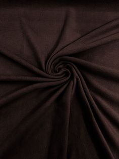 a close up view of a dark brown fabric