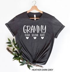 "Grammy T-shirt, Custom Grammy Shirt, Grandma Shirt With Grandchild Names, Mother's Day Shirt, Personalized Mimi Shirt, New Grandma T shirt Thank you for shopping with us❤️ Size - Our products are unisex fit - You can check our size and color charts on our listing photos. How To Order - Select a size - Select a t-shirt color - If available, indicate the design (text) color in the personalization box - Click add to cart. You can go back to add more shirts. - Click \"Proceed to check out\". Care Instruction -Machine wash in cold water -Do not use bleach -Tumble dry low -Inside out, wash with delicate cycle -Do not iron directly over design Production and Shipping - Processing is 1-3 days * Shipping Time is depending on the shipping option that you choose during to checkout process - Please c Grandma T Shirt Ideas, Cricket Ideas, Dad Shirts, Grandma Shirt, New Grandma, Cricut Joy, Design Text