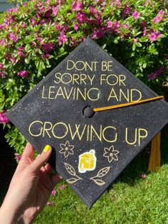 a graduation cap that says, don't be sorry for leaving and growing up