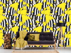 a living room with yellow and black wallpaper