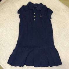 Pleated Skirt. Navy Blue With Polo Collar And Buttons On Front. Never Worn. Non Smoking Home. Casual Pleated School Dresses, Fitted Short Sleeve School Uniform Dresses, Ralph Lauren Dresses, Ralph Lauren Dress, Ralph Lauren Polo, Polo Dress, Polo Collar, Kids' Dresses, Pleated Skirt