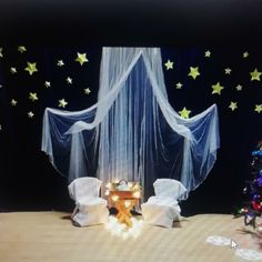 there is a room decorated with stars and curtains