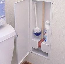 a white toilet sitting in a bathroom next to a sink