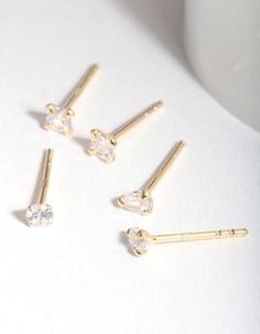 Description
Gold plated sterling silver styles are the ultimate jewellery-box essential. Dress up your look with this classic earring pack with cubic zirconia embellishments.

Size: 3mm (L) x 3mm (W)
Weight: 0.01oz (one earring) Earring Pack, Fashion Jewellery Online, One Earring, Bold Earrings, Essential Dress, Classic Earrings, Hanging Earrings, Favorite Rings, Gold Plated Earrings