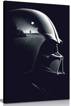 a darth vader helmet is shown in this black and white photo with the light on