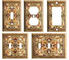 four light switch plates with ornate designs on them, all in gold and red colors