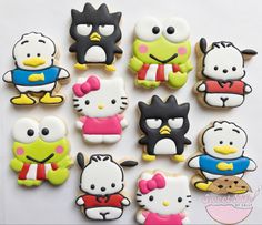 hello kitty cookies are arranged on a table