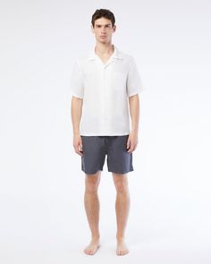 Offered in a linen-tencel blend, our tailored Linen Pull-on short has a stretch waist, embedded with drawcords featuring metal logo tips, a patch pocket in the back as well as two slash pockets in front. The Air Linen Pull-on Short 6" pairs well with the Air Linen Convertible Vacation Shirt. Classic Summer Shorts With Straight Hem, Relaxed Fit Linen Shorts With Welt Pockets, Classic Shorts With Elastic Waistband For Summer, Linen Bottoms With Patch Pockets For Summer, Classic Summer Shorts With Elastic Waistband, Linen Summer Bottoms With Patch Pockets, Logo Tips, Swim Brief, Linen Shop