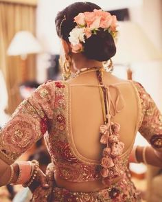 Indian Designer Bridal Blouse Design Designer Bridal Blouse, Indian Bridal Makeup Looks, Blouse Tassels, Blouse Designs Catalogue, Wedding Lehenga Designs, Backless Blouse Designs, Traditional Blouse Designs