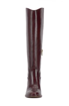 Smooth, polished leather forms the upper of this knee-high boot set atop a slightly curved block heel. 2 3/4" heel 15 1/4" shaft; 14 1/2" regular calf circumference 15 1/4" shaft; 16" wide calf circumference 15 1/4" shaft; 17" extra-wide calf circumference Leather upper/synthetic lining/rubber sole Imported Brown Knee-high Boots With High Shaft For Formal, Brown Knee-high Boots With High Shaft For Formal Occasions, Brown High Shaft Knee-high Boots For Formal, Brown High Shaft Knee-high Boots For Formal Occasions, Formal Tall Leather Platform Boots, Formal Leather Knee-length Boots, Wide Calf Knee-high Boots For Formal Occasions, Burgundy Leather Knee-high Boots, Elegant Burgundy Boots With Leather Lining