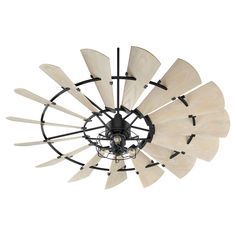 a windmill shaped light fixture with wooden blades on the bottom and black metal rods at the top