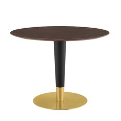 a round wooden table with black legs and gold plated base on an isolated white background