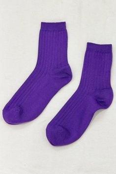 Our OG sock, the girl that started the legacy, is the sock that we felt was missing. She is the sock that will make you throw all your other socks away. Classically ribbed, perfect height, breathable cotton-blend yarn in the most beautiful assortment of colors. She will pair with any shoe, sandals, sneakers, mules, clogs, boots, she is your go-to sock! DETAILS 80% Cotton, 18% Polyester, 2% Spandex One Size fits most (US Women's size 6-10) Machine wash cold Made in South Korea The description is Solid Casual Socks, Purple Cotton Socks For Winter, Purple Cotton Winter Socks, Solid Color Ribbed Mid-calf Socks, Solid Ribbed Mid-calf Socks, Solid Color Mid-calf Ribbed Socks, Shoe Sandals, Vintage Hunting, Ribbed Socks