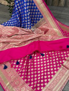 Dazzling rani pink, gold and blue  Katan silk blend Banarsi half and half saree... Soft and smooth, easy to drape ! Fall attached. Note: The color of the products may slightly vary according to the lighting conditions and the color calibration of the viewing LED devices. If you would like more clarity before your purchase, please drop us a message . Pink Pre-draped Saree With Self Design For Celebration, Pink Pre-draped Saree For Festive Celebration, Pink Pre-draped Saree For Celebration, Pink Celebration Pre-draped Saree With Self Design, Celebration Pink Pre-draped Saree With Self Design, Traditional Pink Pre-draped Saree For Celebration, Pink Anarkali Pre-draped Saree For Celebration, Pink Pre-draped Saree With Pallu For Celebration, Blue Pre-draped Saree For Eid Celebration