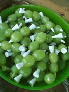 green grapes with white cheese in a bowl