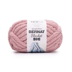 the yarn ball is pink and has a white label on it that says bernat big