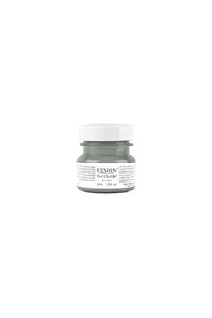 a jar of gray paint on a white background with the words fusion written in it