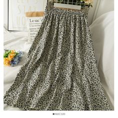 Size: one size Fabric: other Color: black, coffee, apricot, yellow, orange Chic Beige Floral Print Skirt, Beige Floral Print Midi Skirt, Beige Tiered Maxi Skirt With Floral Print, Beige Floral Print Tiered Maxi Skirt, Casual Beige Flared Dress, Casual Beige Flared Skirt Dresses, Casual Beige Dress With Flared Skirt, Casual Beige Dresses With Flared Skirt, Hong Kong Style