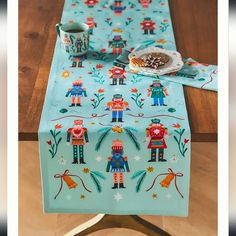 an image of a table runner with nutcrackers on it